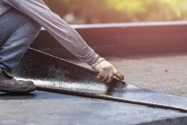 Professional Basement Waterproofing technician working in Falmouth, IN